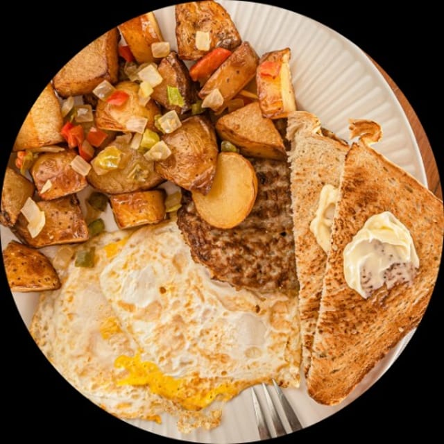 2 Eggs, Breakfast Meat & 2 Sides.